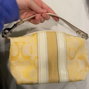 Pale yellow original Coach purse